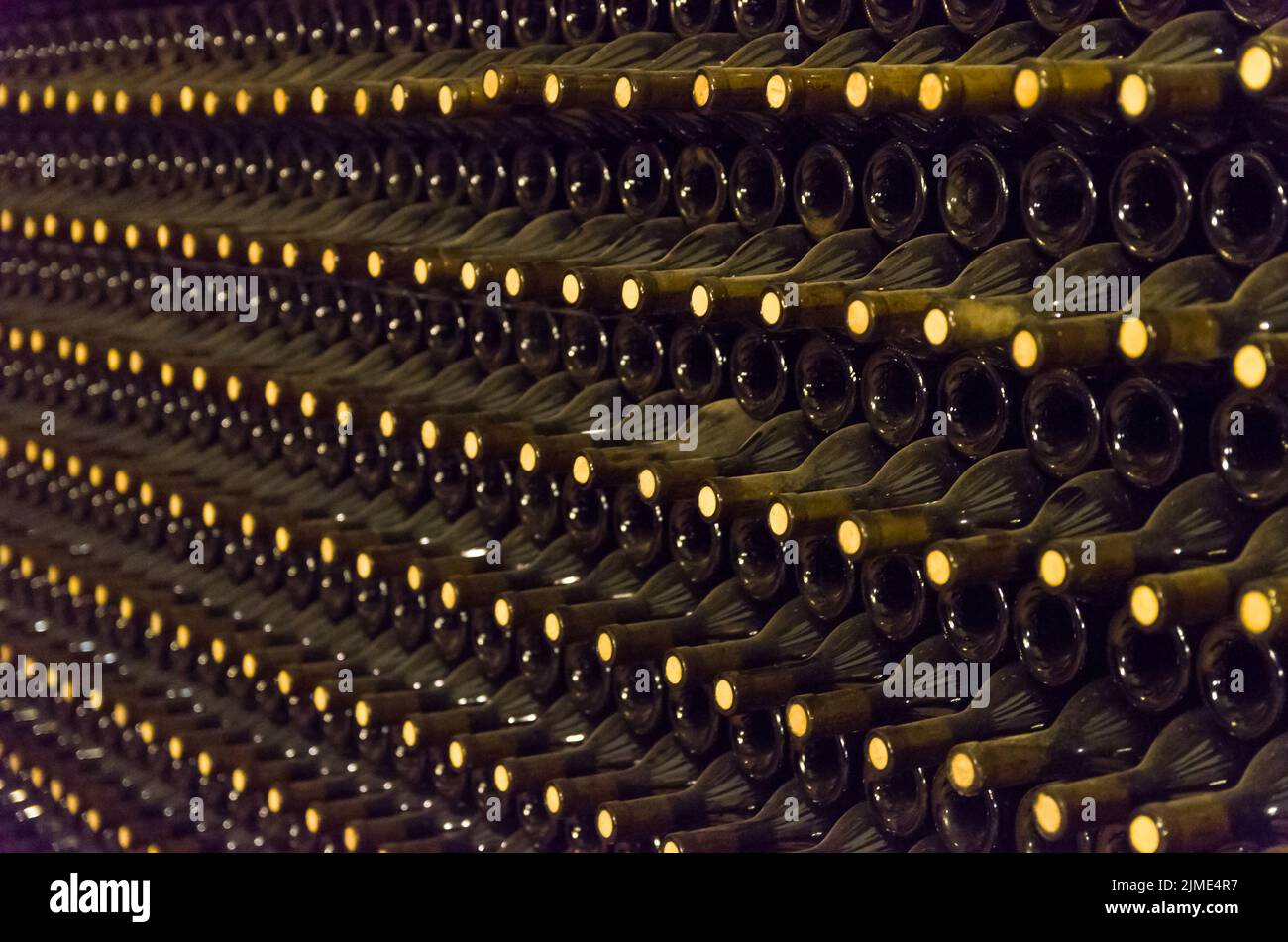 Wine bottles stored in the underground cellar for aging Stock Photo Alamy