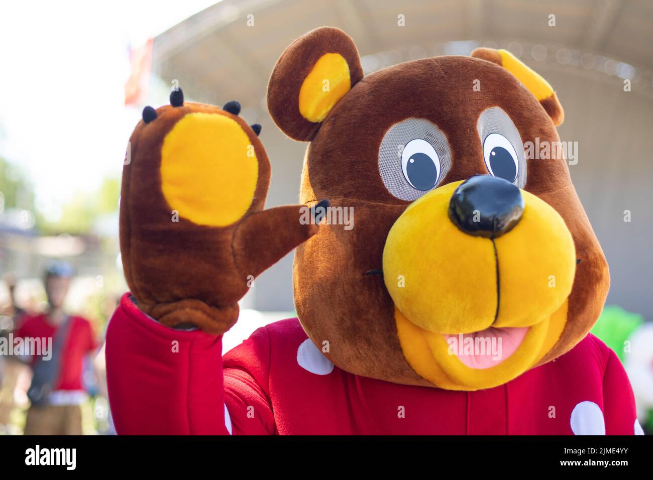 Animator in a bear costume. A man in a full-length suit for the holiday. Stock Photo