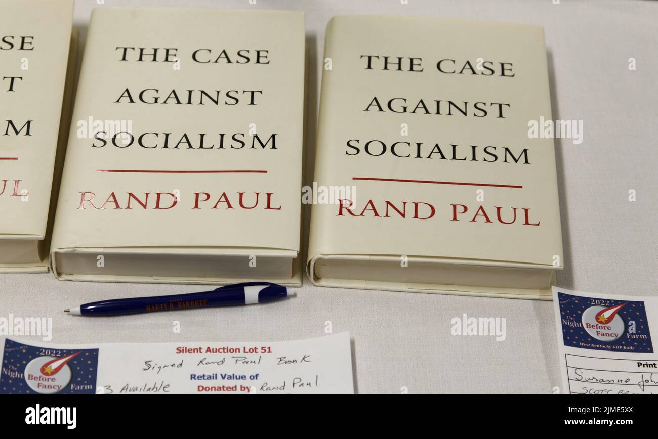 Calvert City, KY, USA. 05 Aug 2022. Three autographed copies of Sen. Rand Paul's book, 'The Case Against Socialism,' elicit bids in a silent auction being held during the Night Before Fancy Farm West Kentucky GOP Rally at the Calvert City Civic Center. Paul was scheduled to give the keynote address but asked his wife to fill in after being unexpectedly needed in Washington. (Credit: Billy Suratt/Apex MediaWire via Alamy Live News) Stock Photo