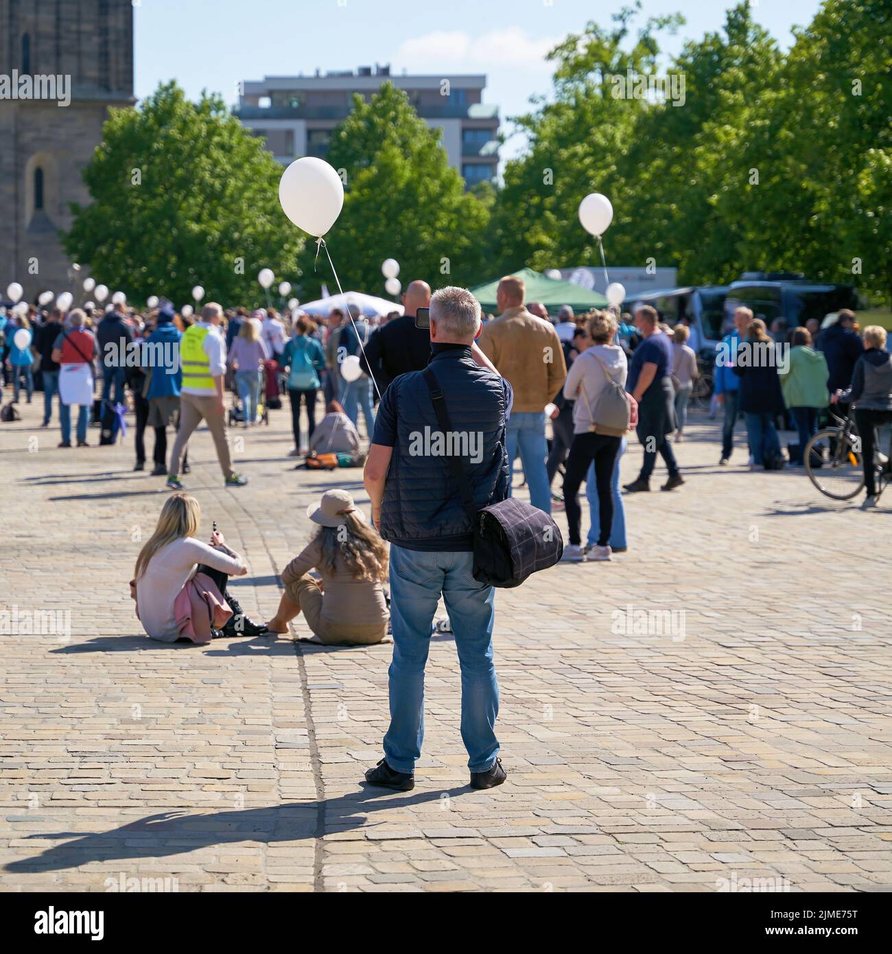 Protest event during the Corona pandemic on the cathedral square in Magdeburg in Germany Stock Photo