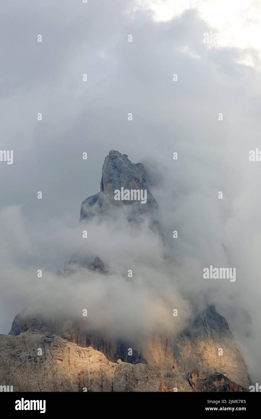 Mountain called Cimon della Pala with white clouds in the Italian Dolomites in summer Stock Photo