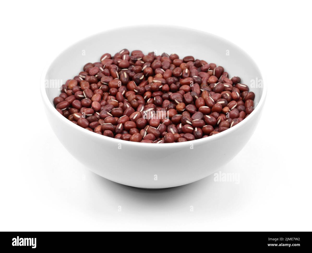 Azuki Bean or Red Bean Seeds in a bowl isolated on white background