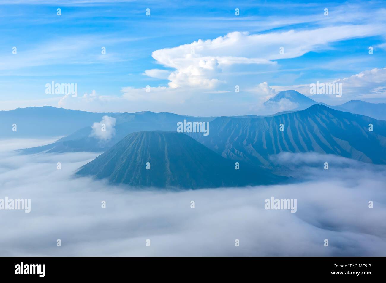 Morning Fog Near Java Volcanoes Stock Photo