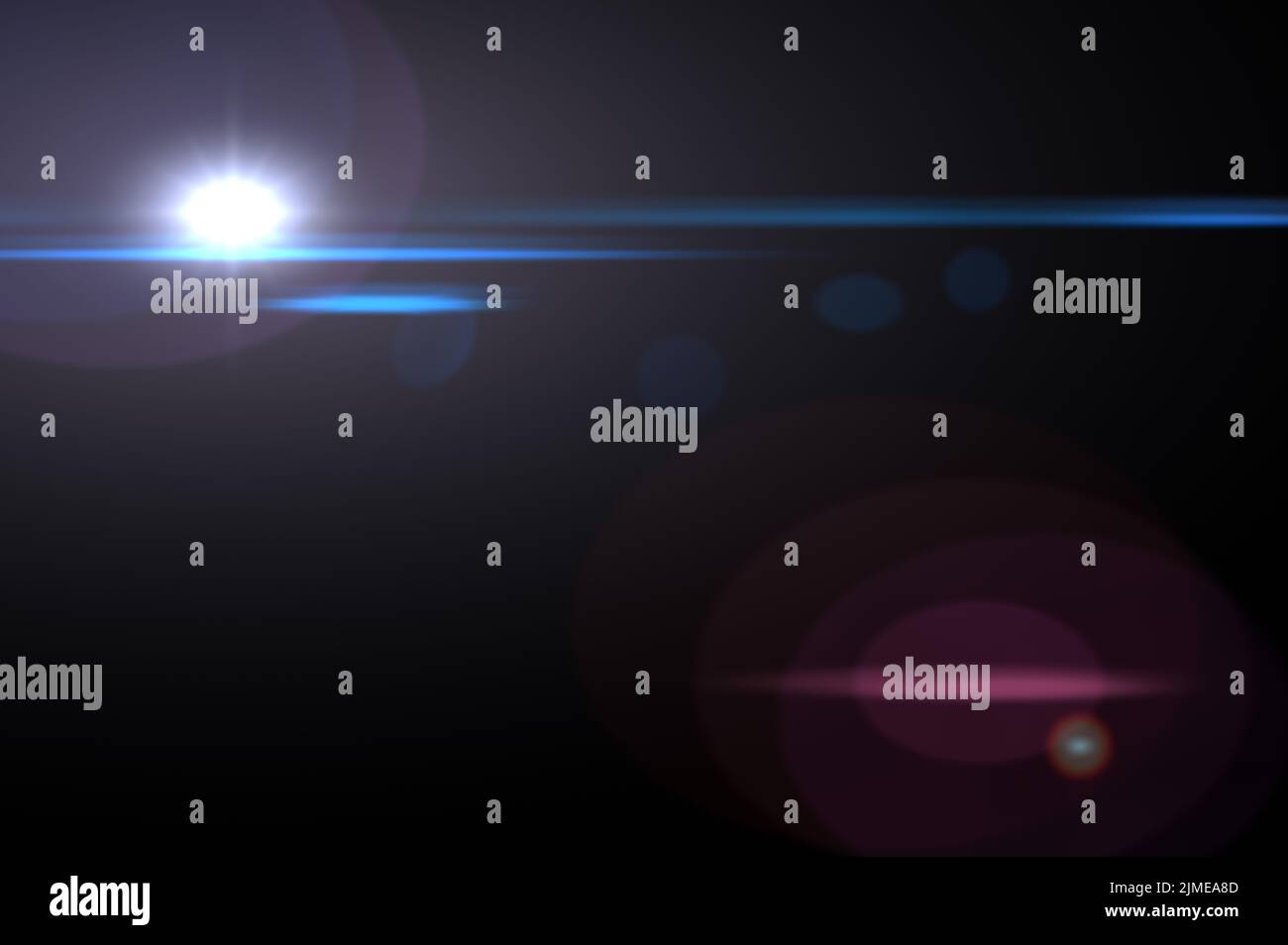 abstract lens flare blue light over black background. Blue light on ...