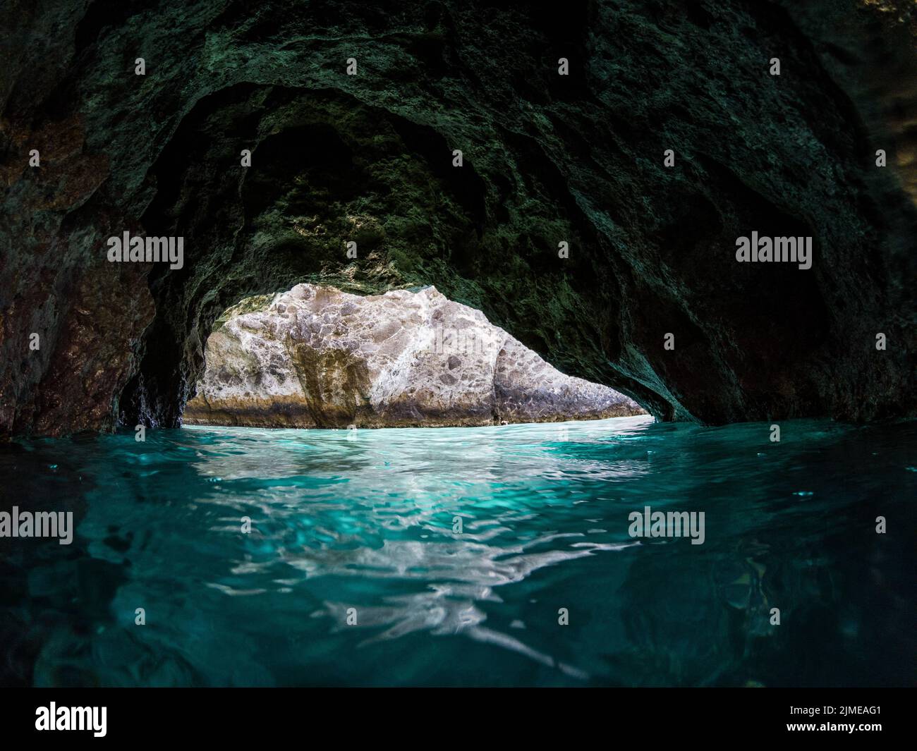 Amazing rocks in clear blue water Stock Photo - Alamy