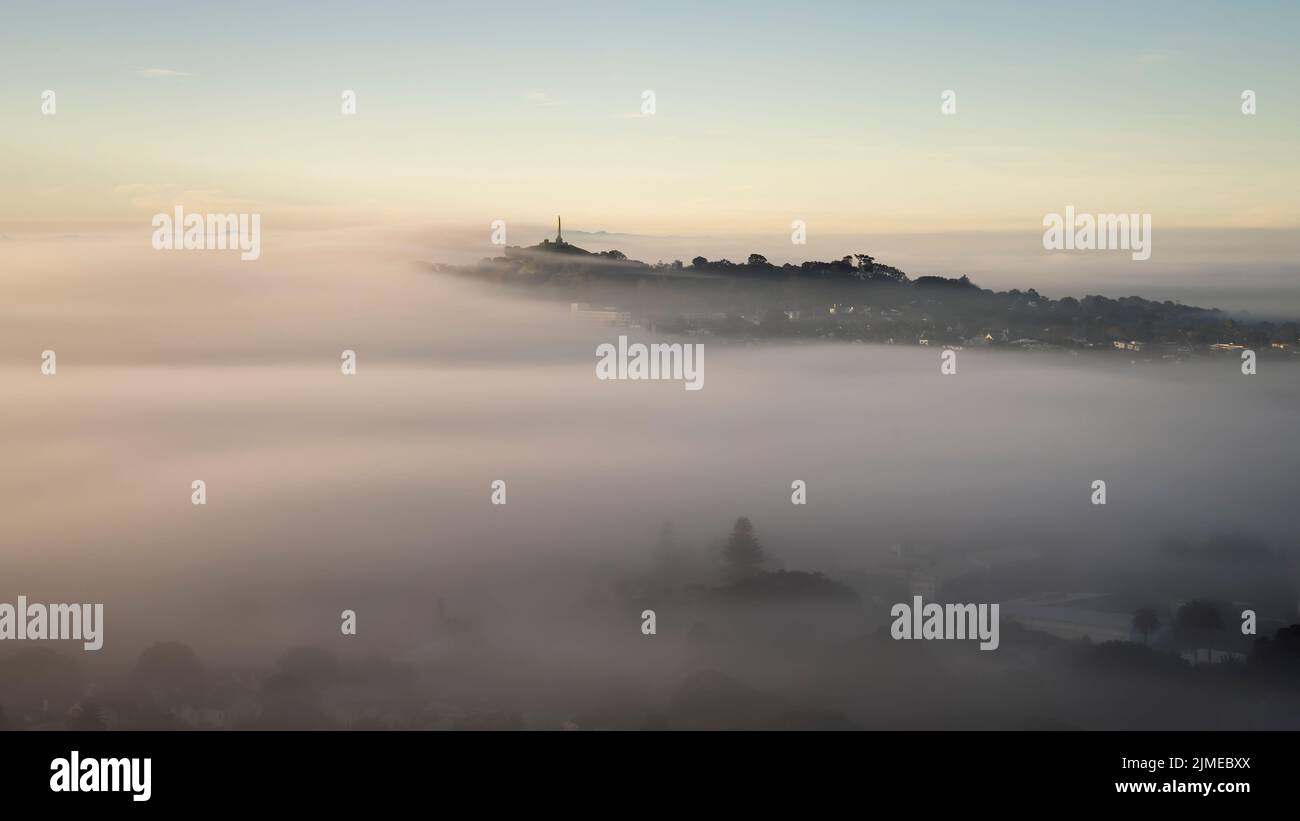 One Tree Hill in the fog, Auckland. Stock Photo
