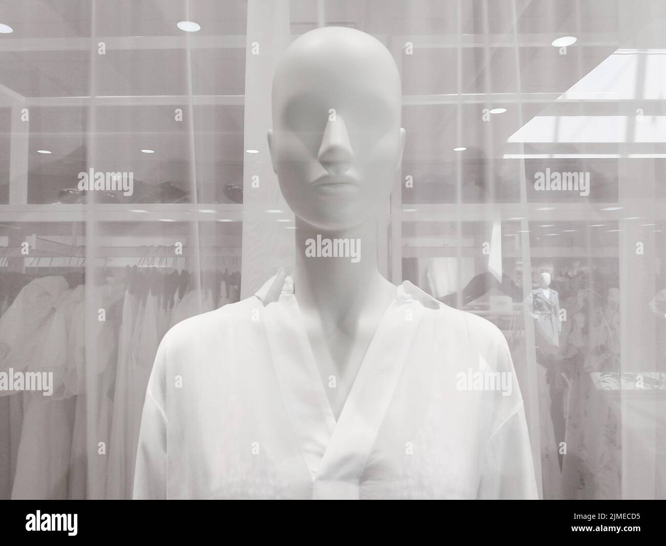 White female mannequin in clothing store window, closeup Stock Photo
