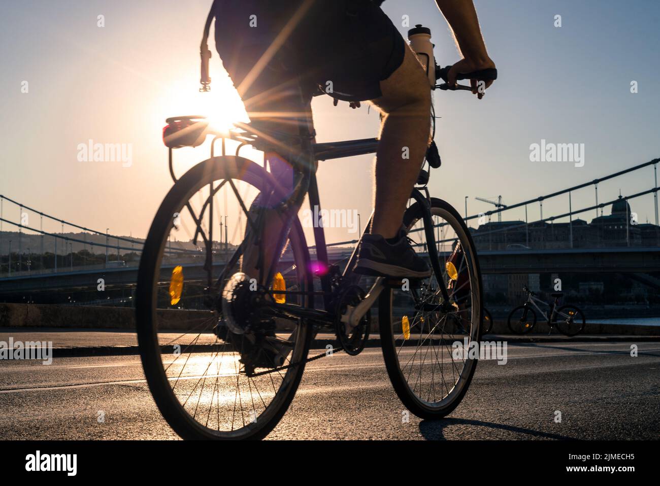 Bicyclist in a city ride Stock Photo