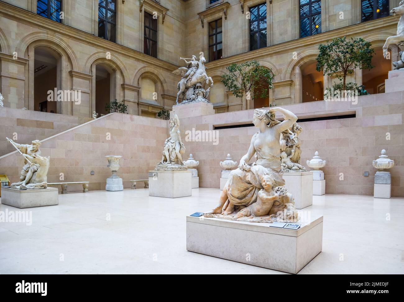 Paris / France April 04 2019. Ancient sculptures in the inner hall of Louvre museum Stock