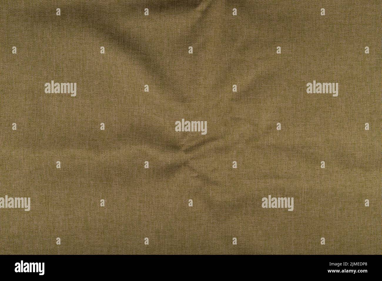 Light beige fabric texture top view and closeup on a piece of linen