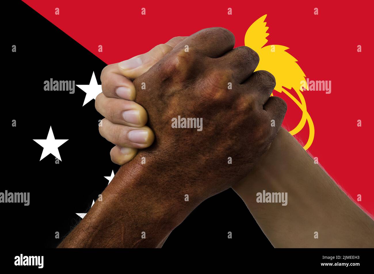 Flag of Papua New Guinea, intergration of a multicultural group of young people Stock Photo