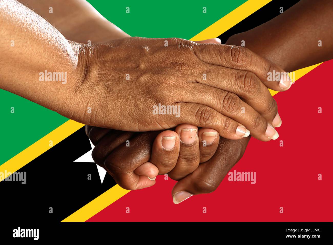 Flag of Saint Vincent and the Grenadines, intergration of a multicultural group of young people Stock Photo