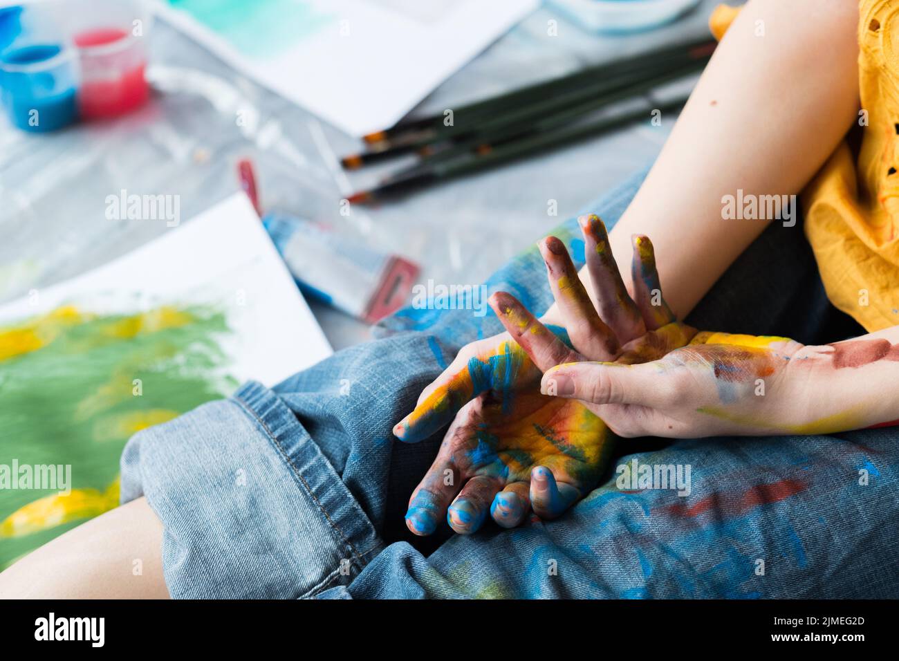 creativity crisis artist hands colorful paint Stock Photo Alamy