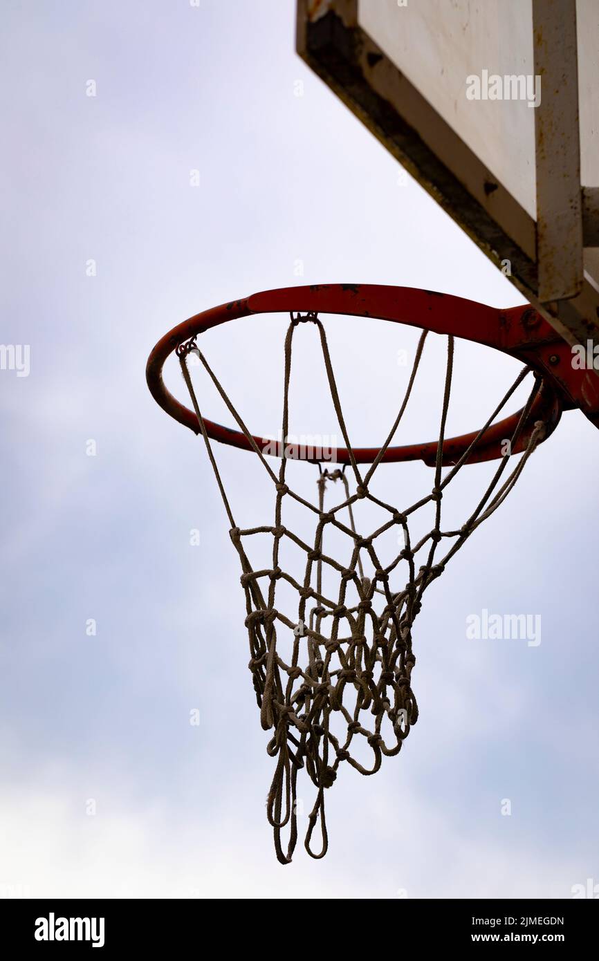 Outdoor basketball hoop on a stormy sky. Playground Stock Photo Alamy