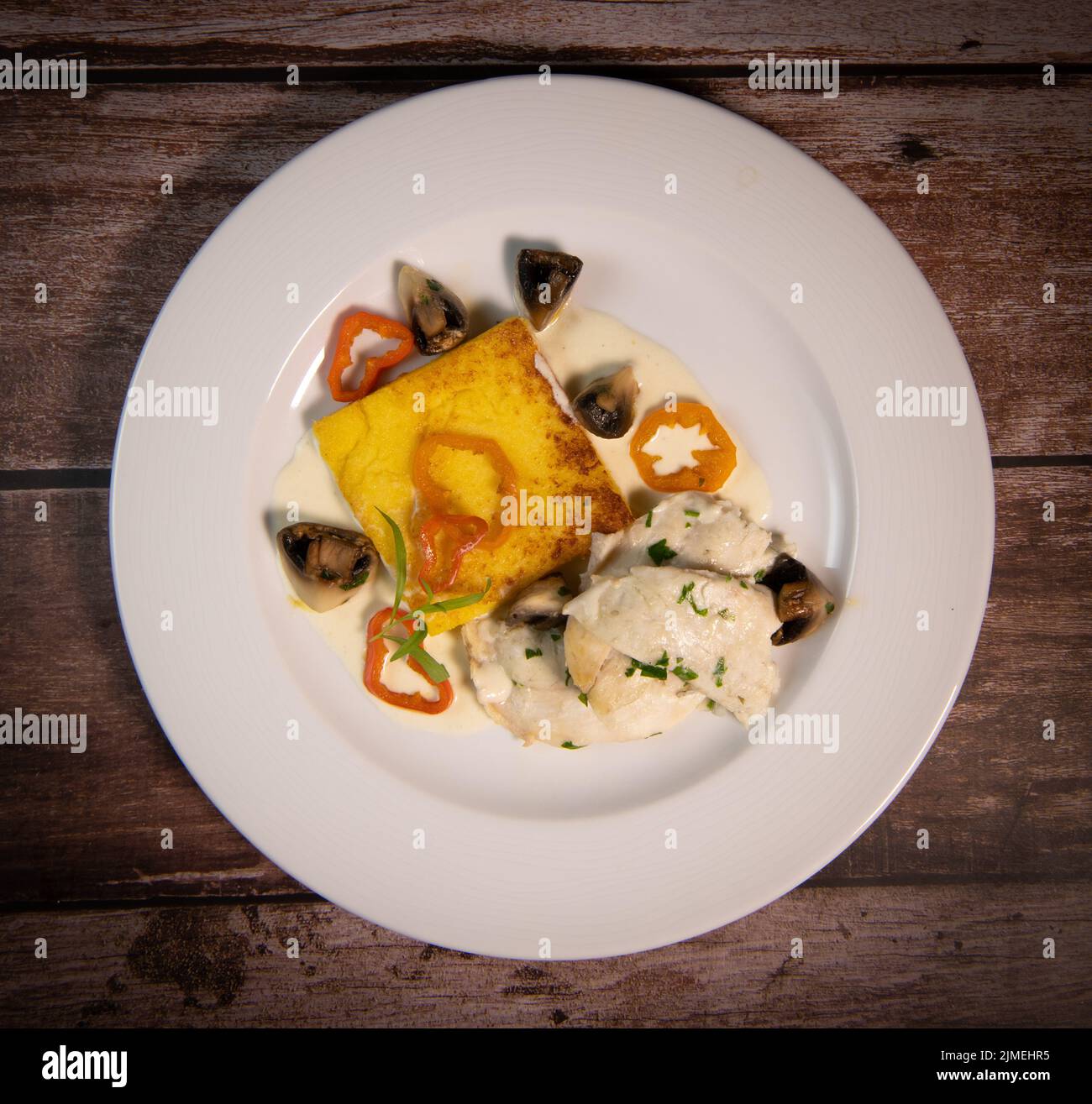 Recipe for sea bass fillet with fried polenta and white wine sauce