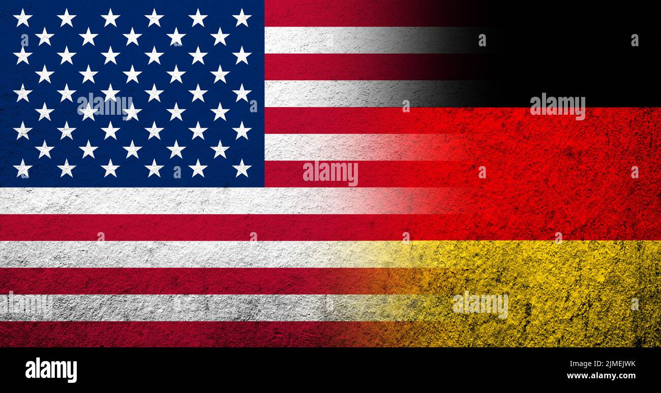 United States of America (USA) national flag with national flag of Germany . Grunge background Stock Photo