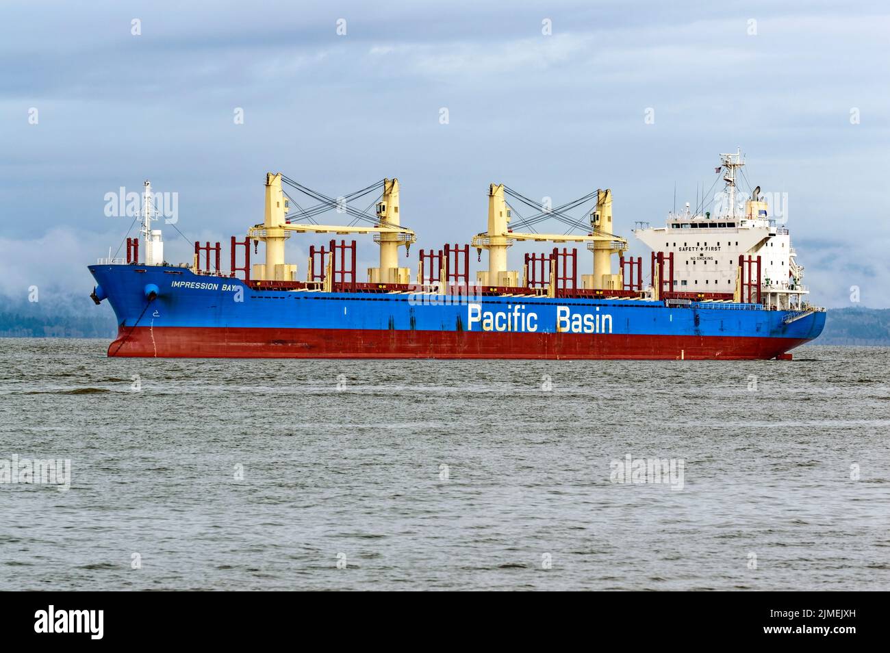 The Impression Bay bulk carrier cargo ship anchored in the Columbia