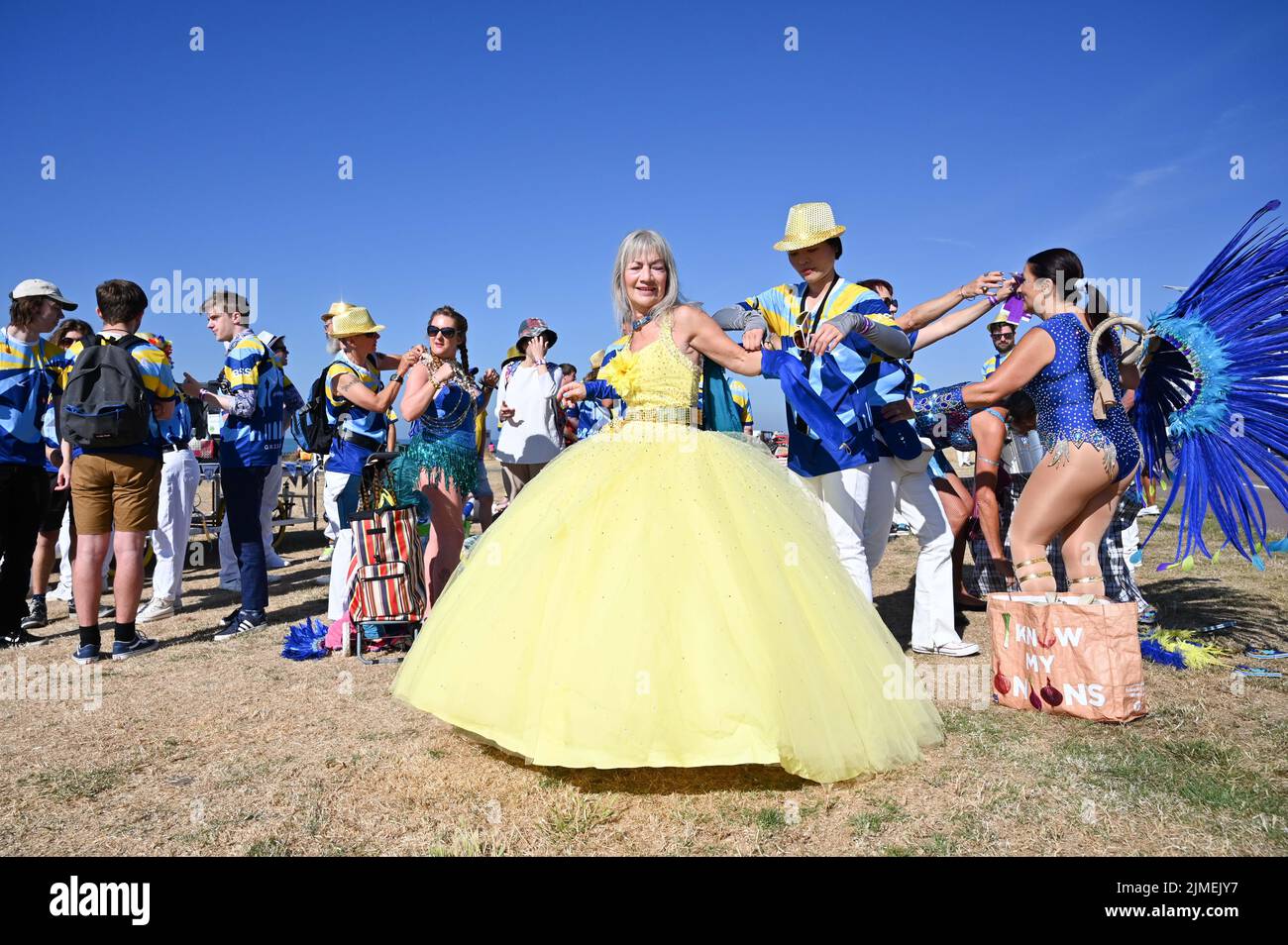 Brighton UK 6th August 2022 - Early arrivals get their costumes ready for Brighton and Hove Pride Parade on a beautiful hot sunny day. With good weather forecast large crowds are expected to attend the UK's biggest LGBTQ Pride festival in Brighton over the weekend : Credit Simon Dack / Alamy Live News Stock Photo
