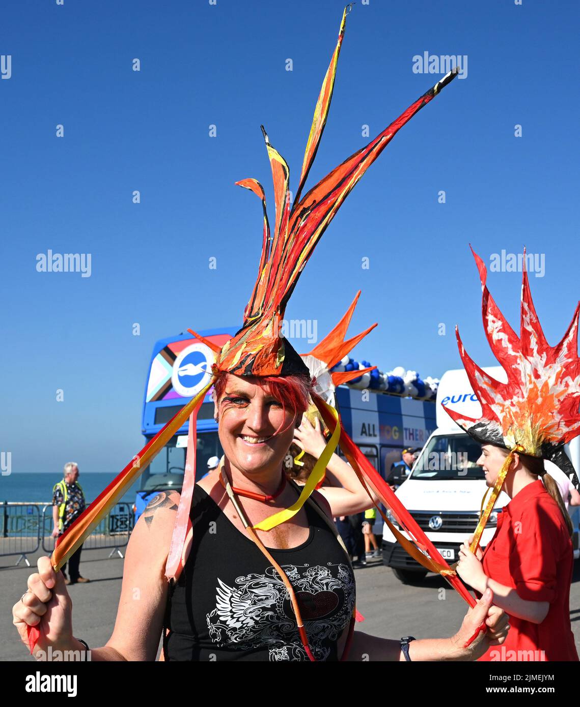 Brighton UK 6th August 2022 - Early arrivals get their costumes ready for Brighton and Hove Pride Parade on a beautiful hot sunny day. With good weather forecast large crowds are expected to attend the UK's biggest LGBTQ Pride festival in Brighton over the weekend : Credit Simon Dack / Alamy Live News Stock Photo