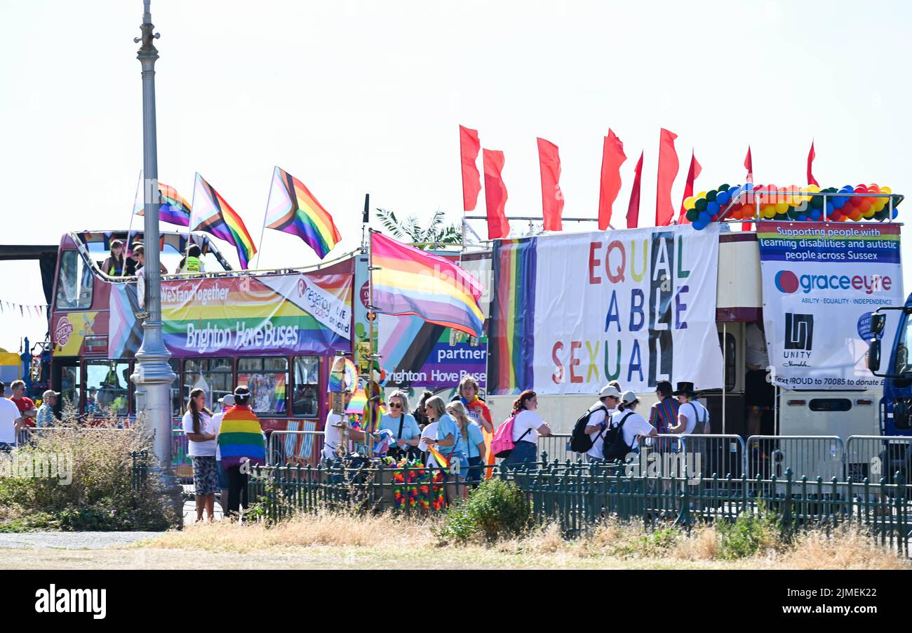 Brighton UK 6th August 2022 - Early arrivals get the floats ready for Brighton and Hove Pride Parade on a beautiful hot sunny day. With good weather forecast large crowds are expected to attend the UK's biggest LGBTQ Pride festival in Brighton over the weekend : Credit Simon Dack / Alamy Live News Stock Photo