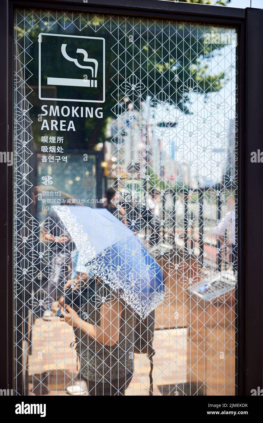 Smoking area, Shinjuku, Tokyo, Japan Stock Photo