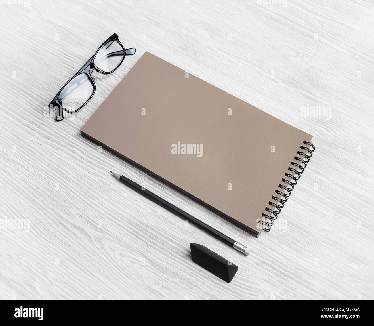 Kraft sketchbook, glasses, pencil, eraser Stock Photo Alamy