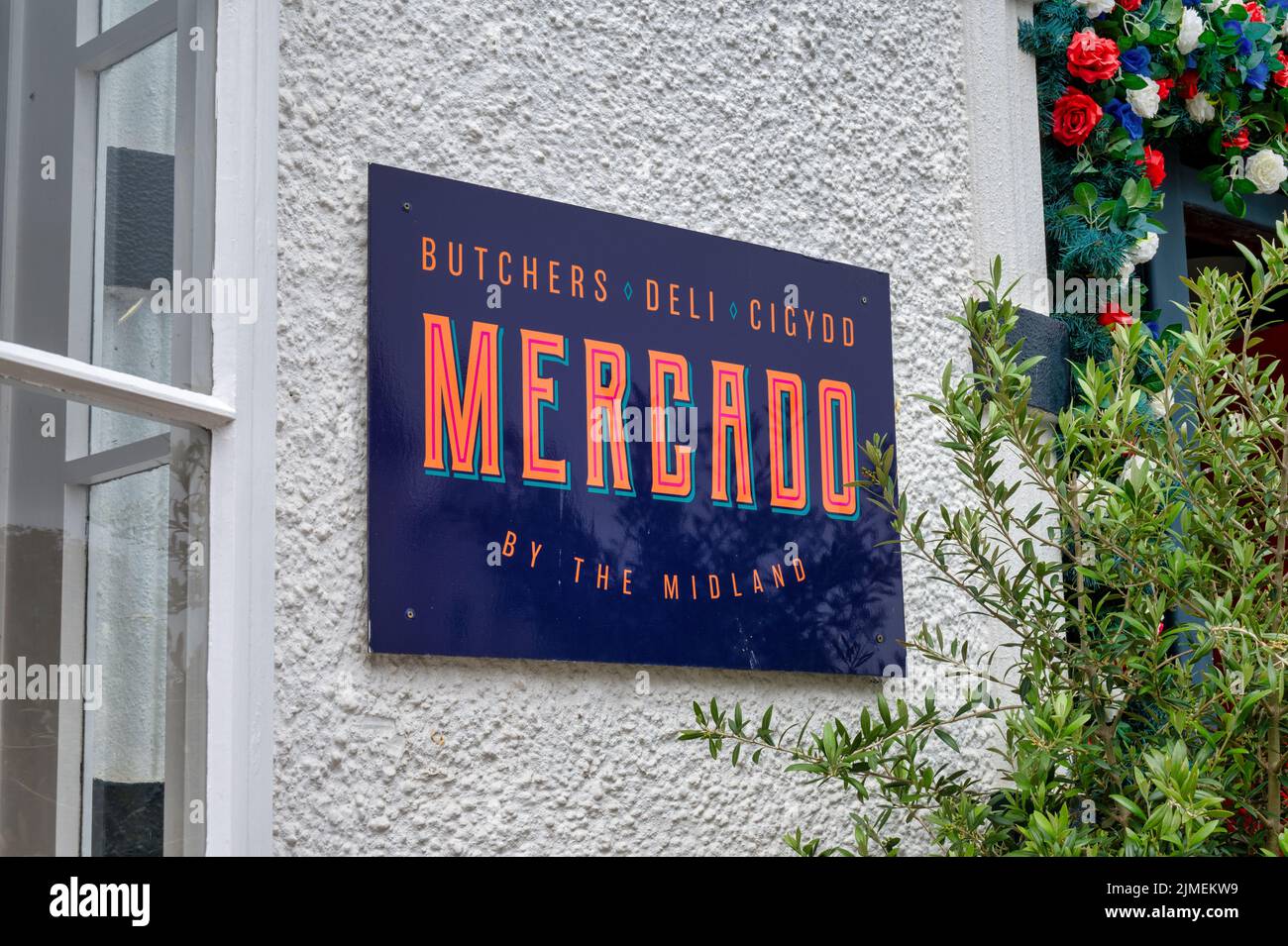 Beaumaris, UK- July 8, 2022: The sign for Mercado butchers and deli in Beaumaris on the isalnd of Anglesey Wales Stock Photo