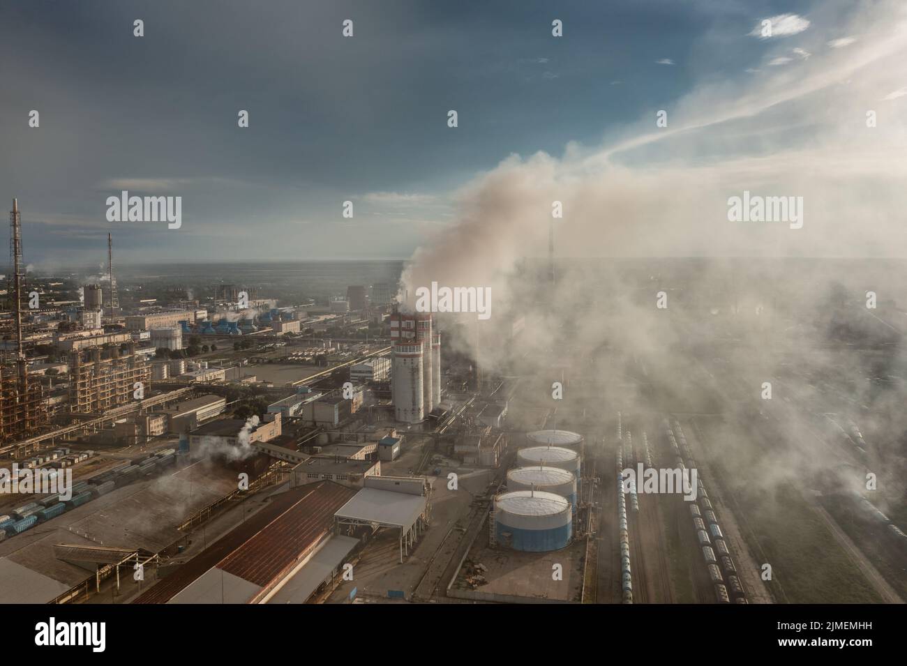 Oil and gas refinery plant in smoke Stock Photo
