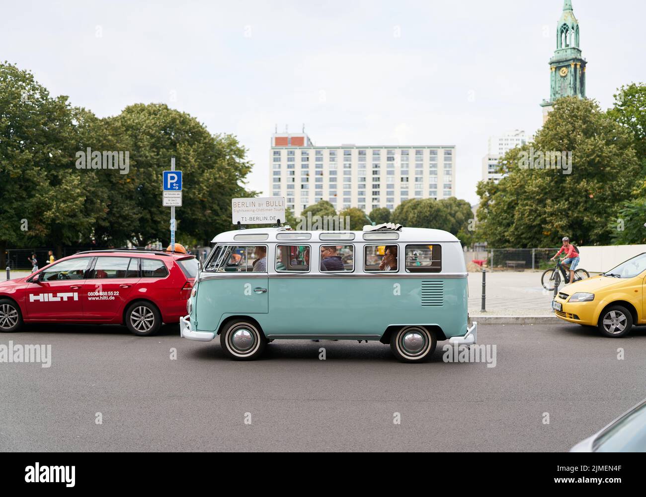 Sightseeing tour with guide in an old VW Bulli through the city center of Berlin Stock Photo