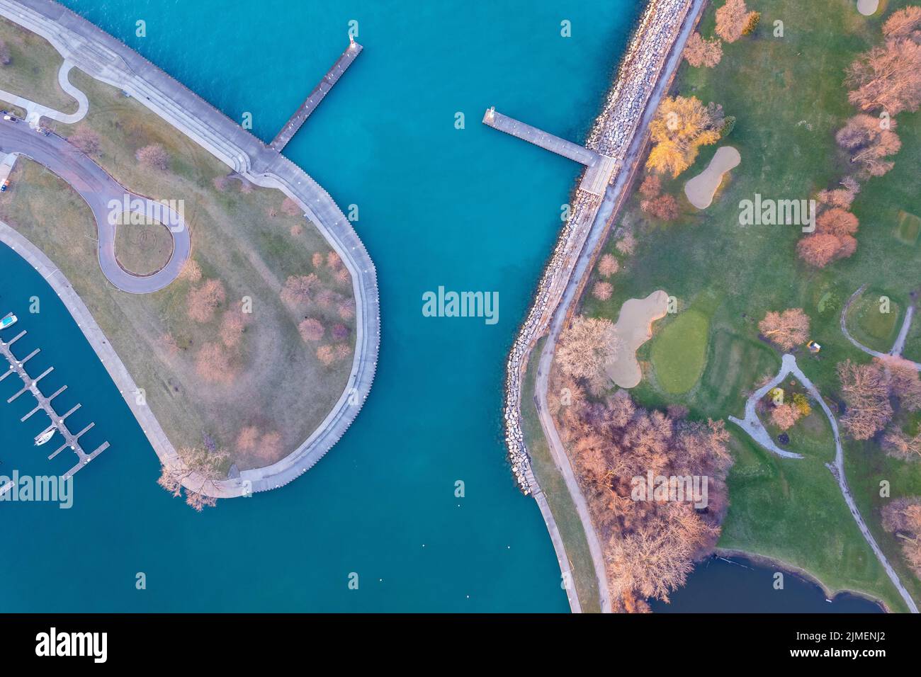 An aerial top view of green parks and harbors on peninsulas of Montrose