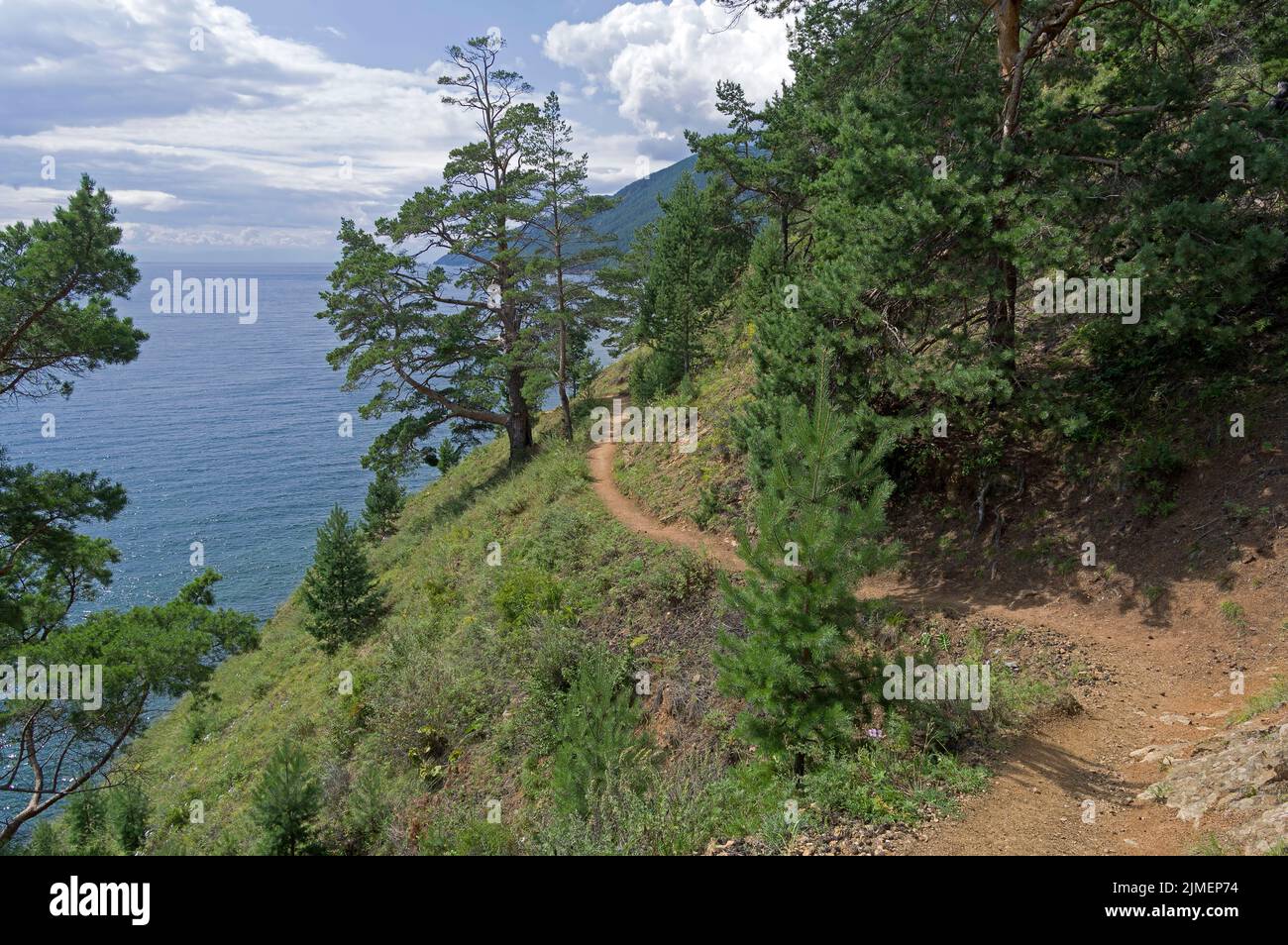 Trail on the high shore of Lake Baikal. Stock Photo