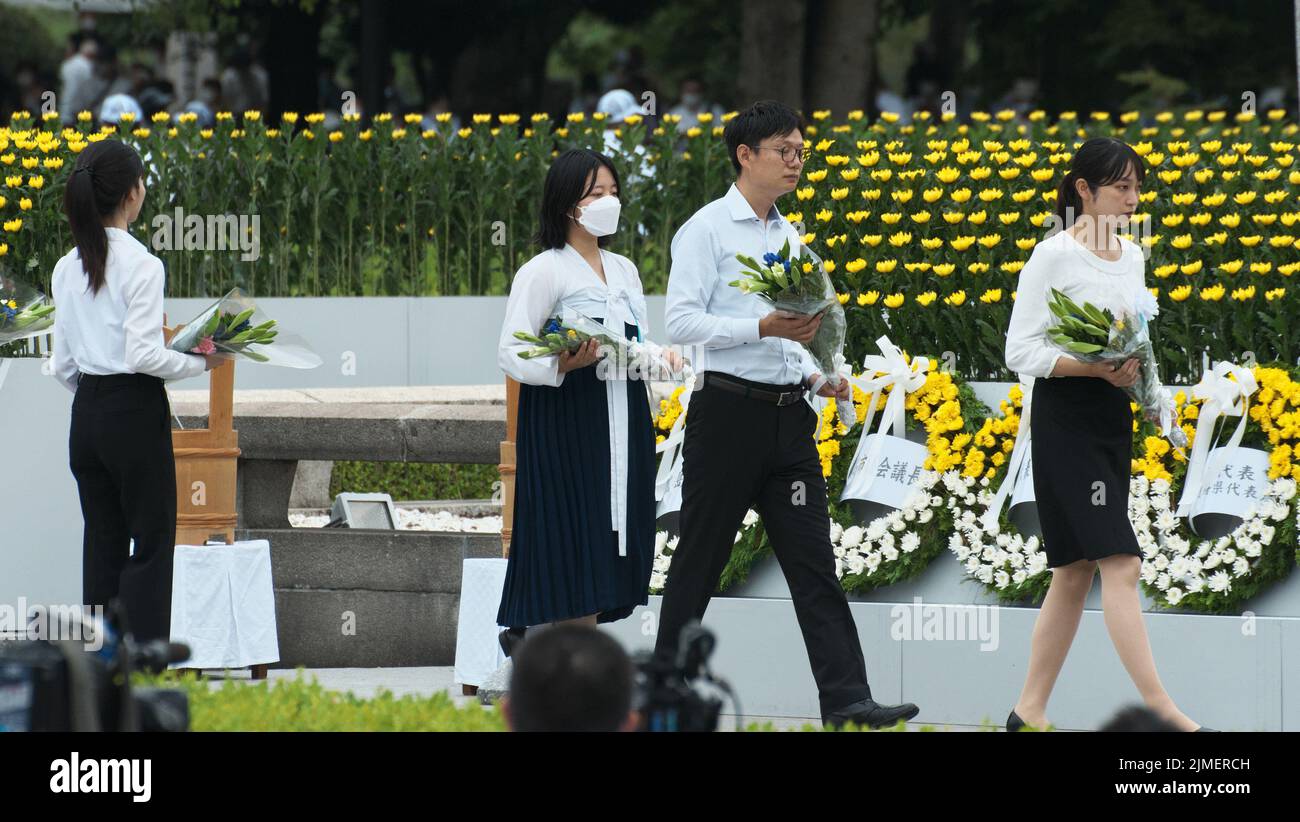 Hiroshima, Japan. 06th Aug, 2022. Citizens of Hiroshima offer flowers during a ceremony marks the 77th anniversary of the Hiroshima Atomic Bombing in Hiroshima-Prefecture, Japan on Saturday, August 6, 2022. Photo by Keizo Mori/UPI Credit: UPI/Alamy Live News Stock Photo
