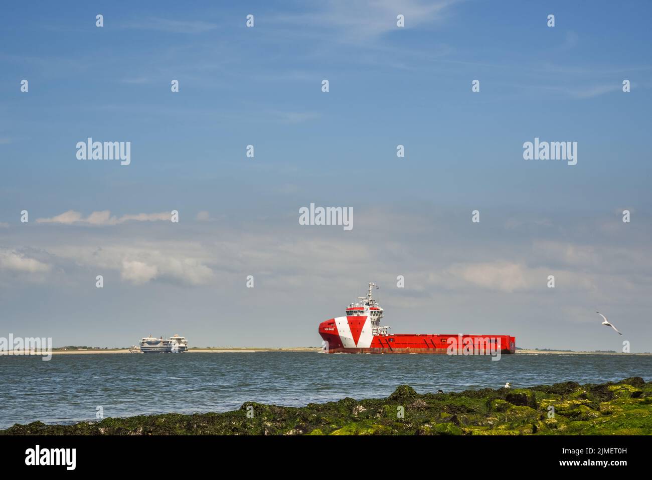 Den Helder, Netherlands. July 2022. Supplier through the Marsdiep on its way to a drilling platform with supplies. High quality photo Stock Photo