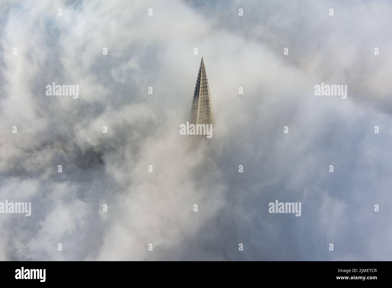 Russia, St. Petersburg, 14 October 2021: The top of the tallest skyscraper in Europe above the clouds, the building of the Gazpr Stock Photo