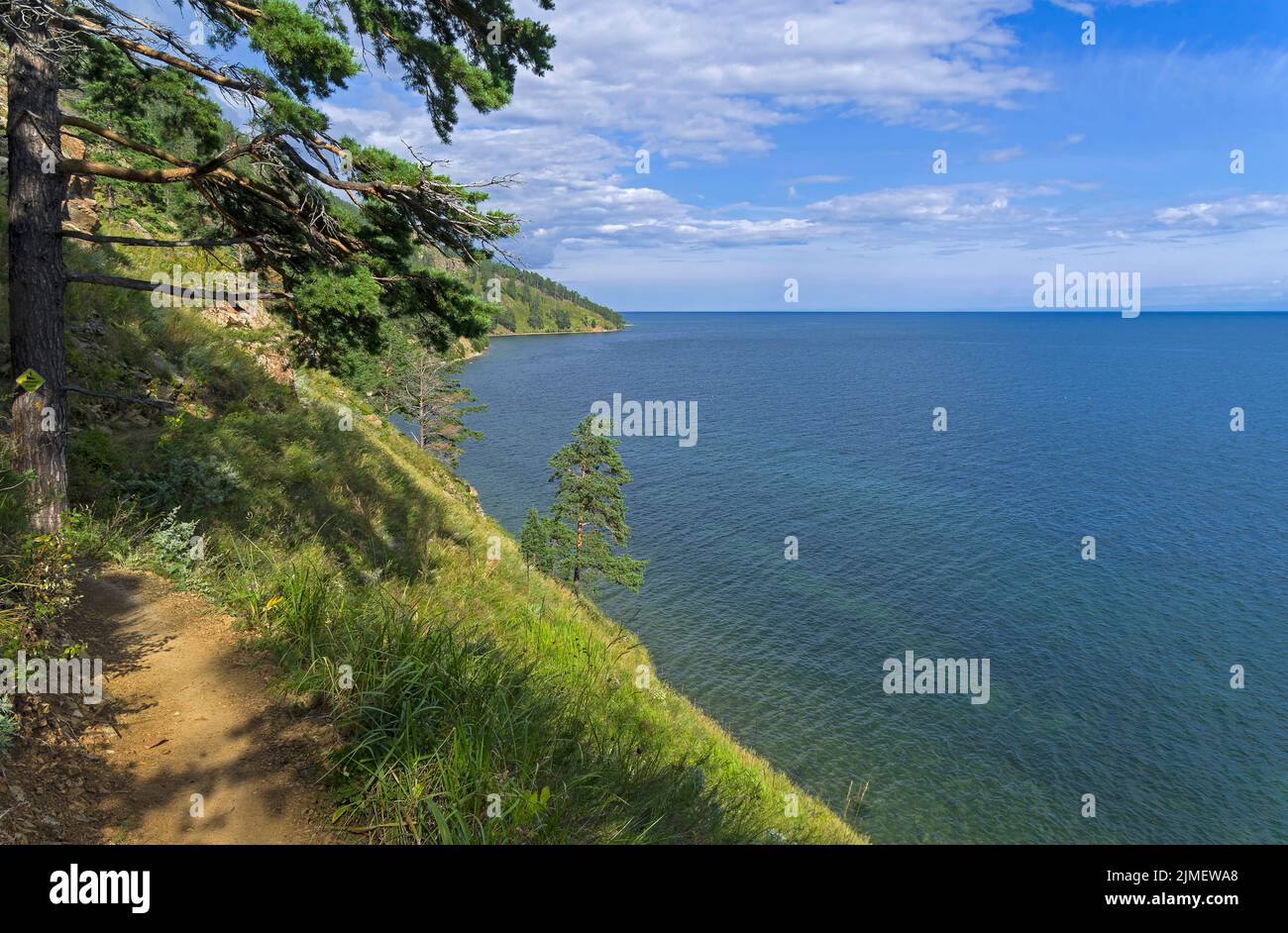 Trail on the high shore of Lake Baikal. Stock Photo