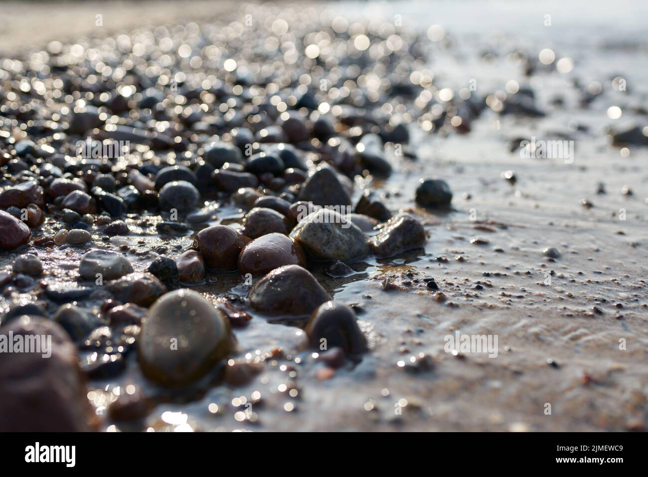 Pebbles on the beach of the Polish Baltic Sea coast near Kolobrzeg at