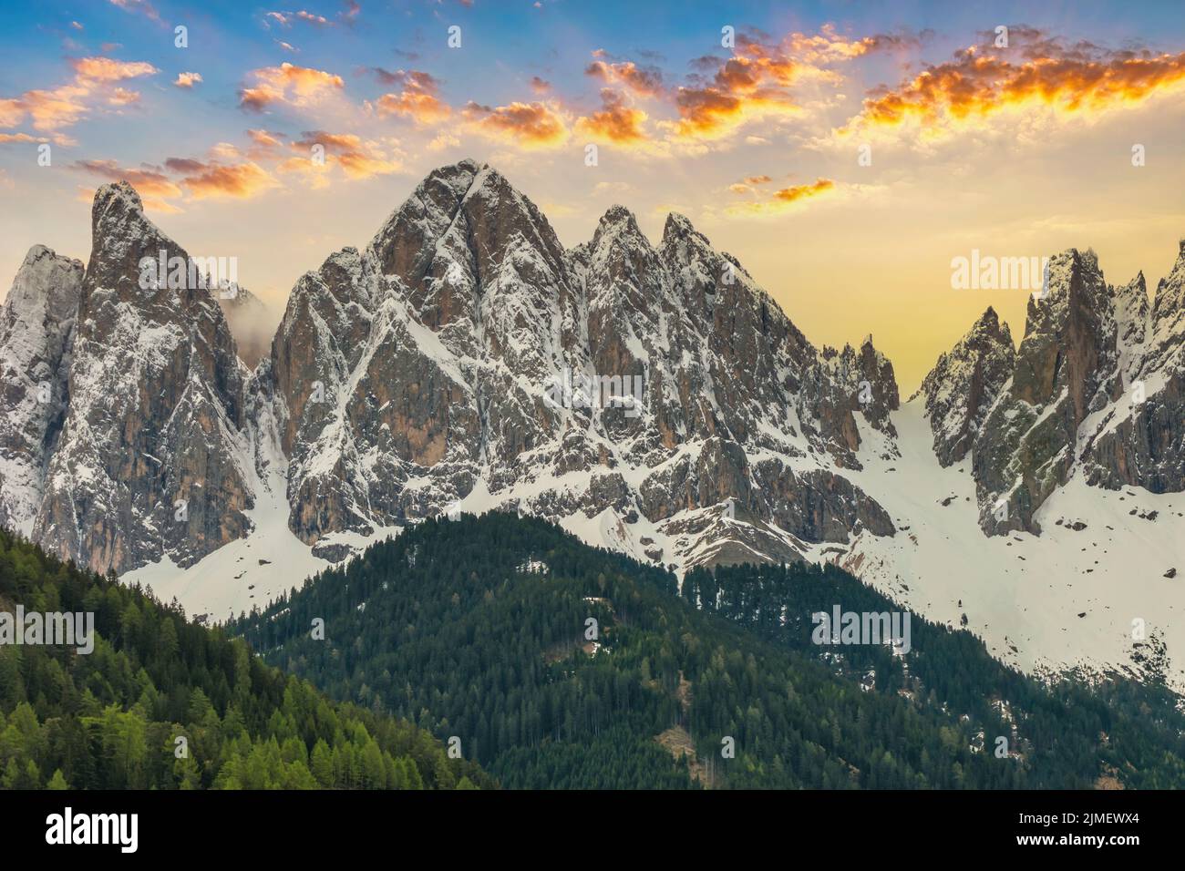 Dolomites Alps mountain sunrise landscape at Santa Maddalena village with walk path in spring season Stock Photo