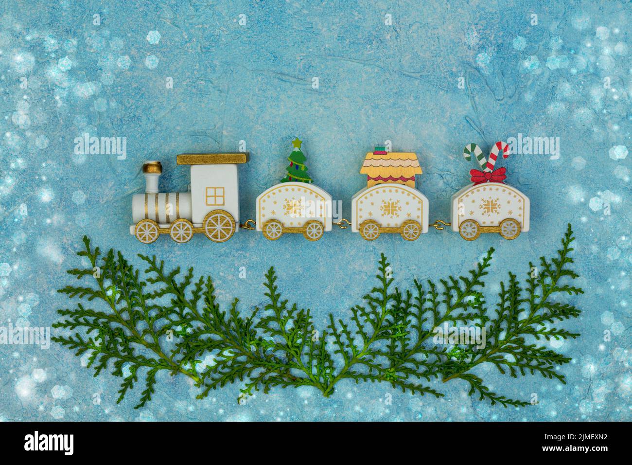 Christmas card with a miniature train. Stock Photo