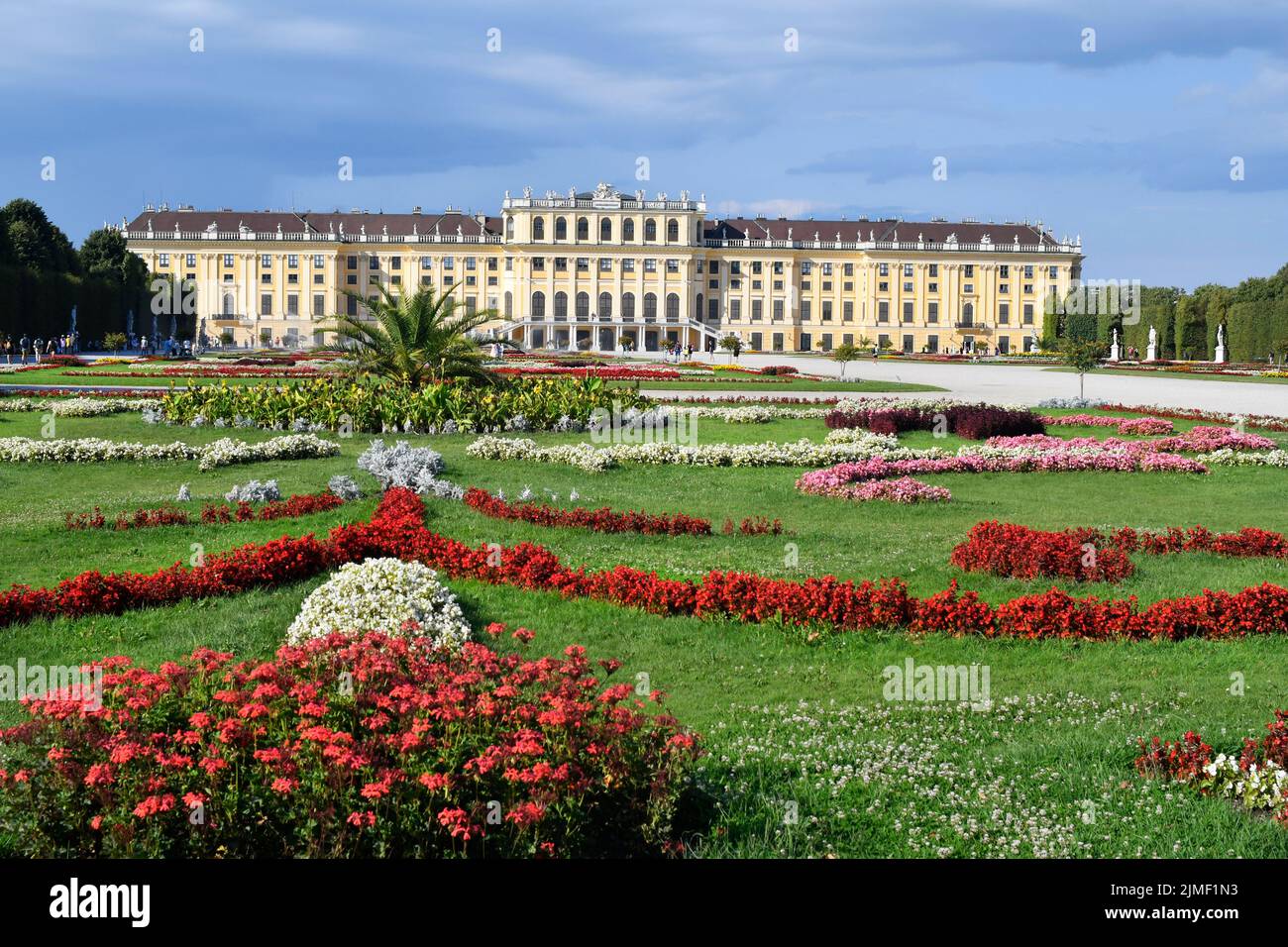 Vienna, Austria - August 01, 2022: Unidentified tourists and Schoenbrunn Palace from the 18th century - former residence of the Habsburg rulers and to Stock Photo