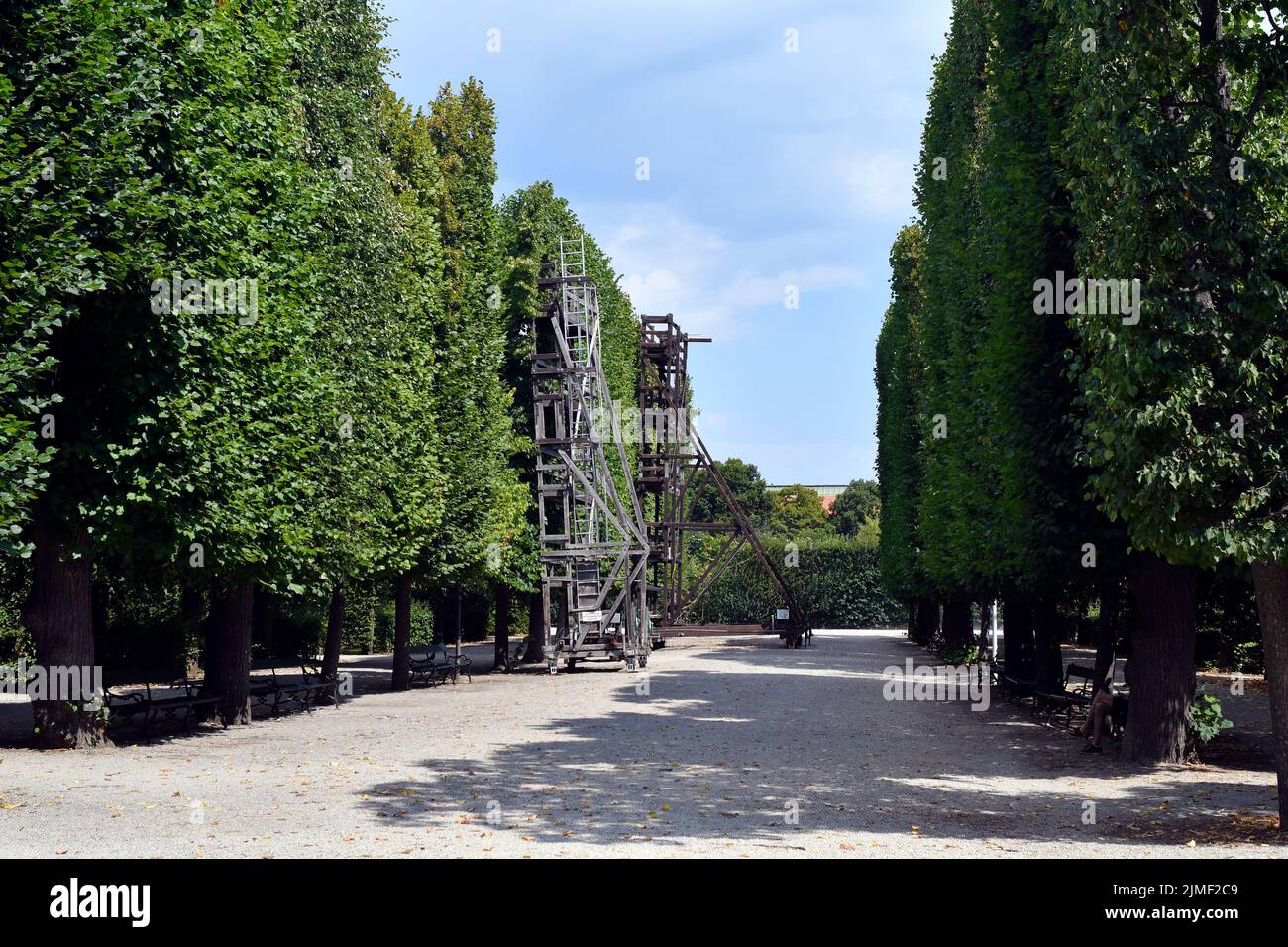 Austria, Vienna, avenue of trees and device for facioning the trees in the park of former residence of the Habsburg rulers and today a UNESCO World He Stock Photo