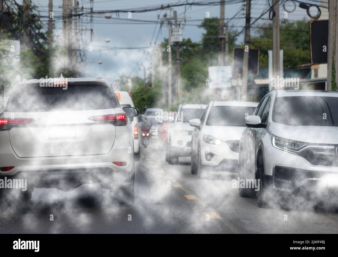 Car exhaust fumes during traffic jams on the road cause environmental