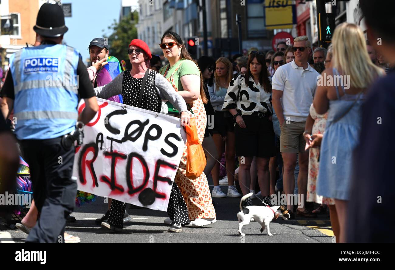 Brighton UK 6th August 2022 - A No Cops at Pride protest at  the  Brighton and Hove Pride Parade on a beautiful hot sunny day. With good weather forecast large crowds are expected to attend the UK's biggest LGBTQ Pride festival in Brighton over the weekend : Credit Simon Dack / Alamy Live News Stock Photo