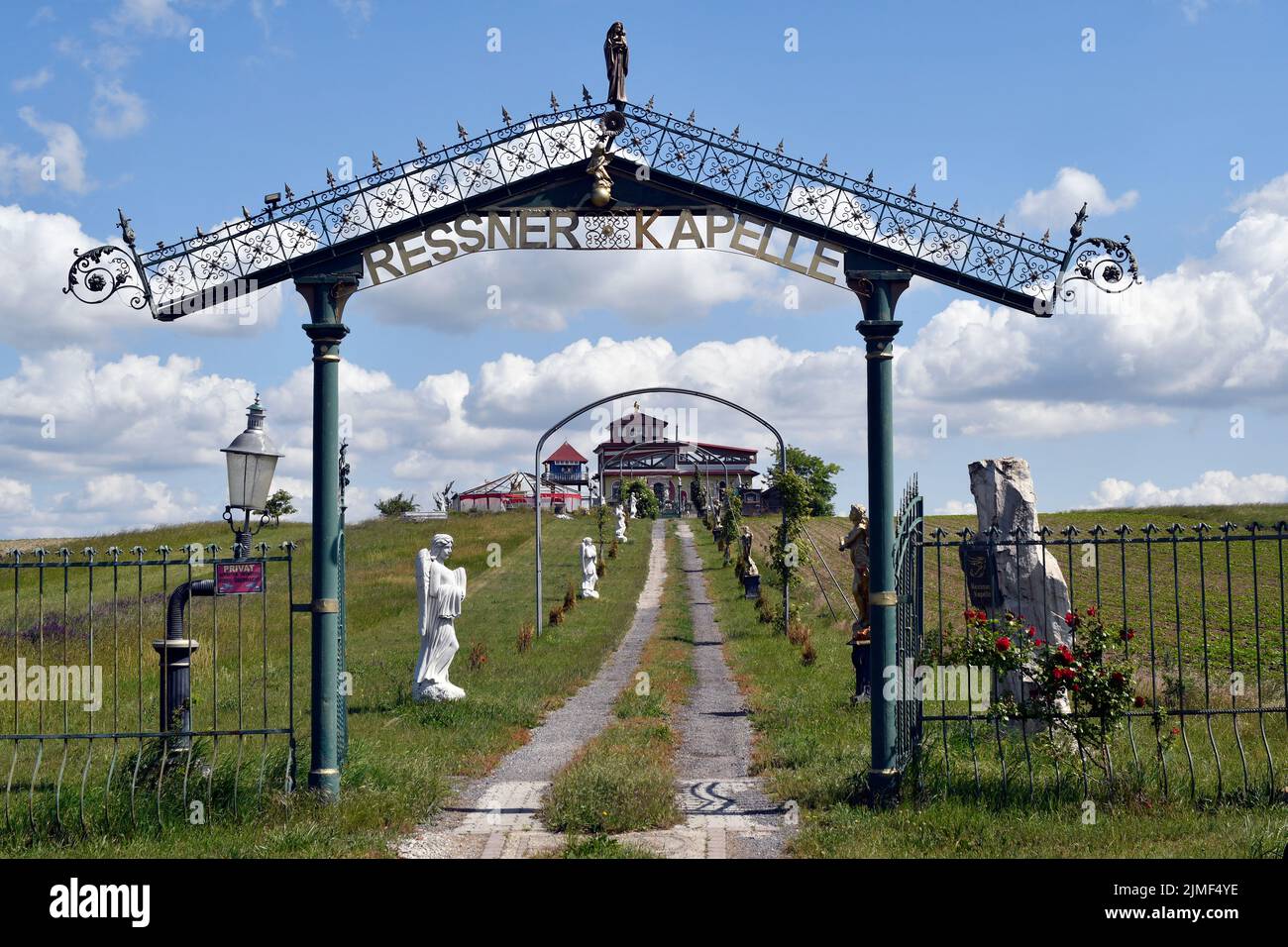 Rauchenwarth, Austria - June 01, 2022:  Private Ressner chapel with many angel statues and buildings near Rauchenwarth village in Lower Austria, erect Stock Photo