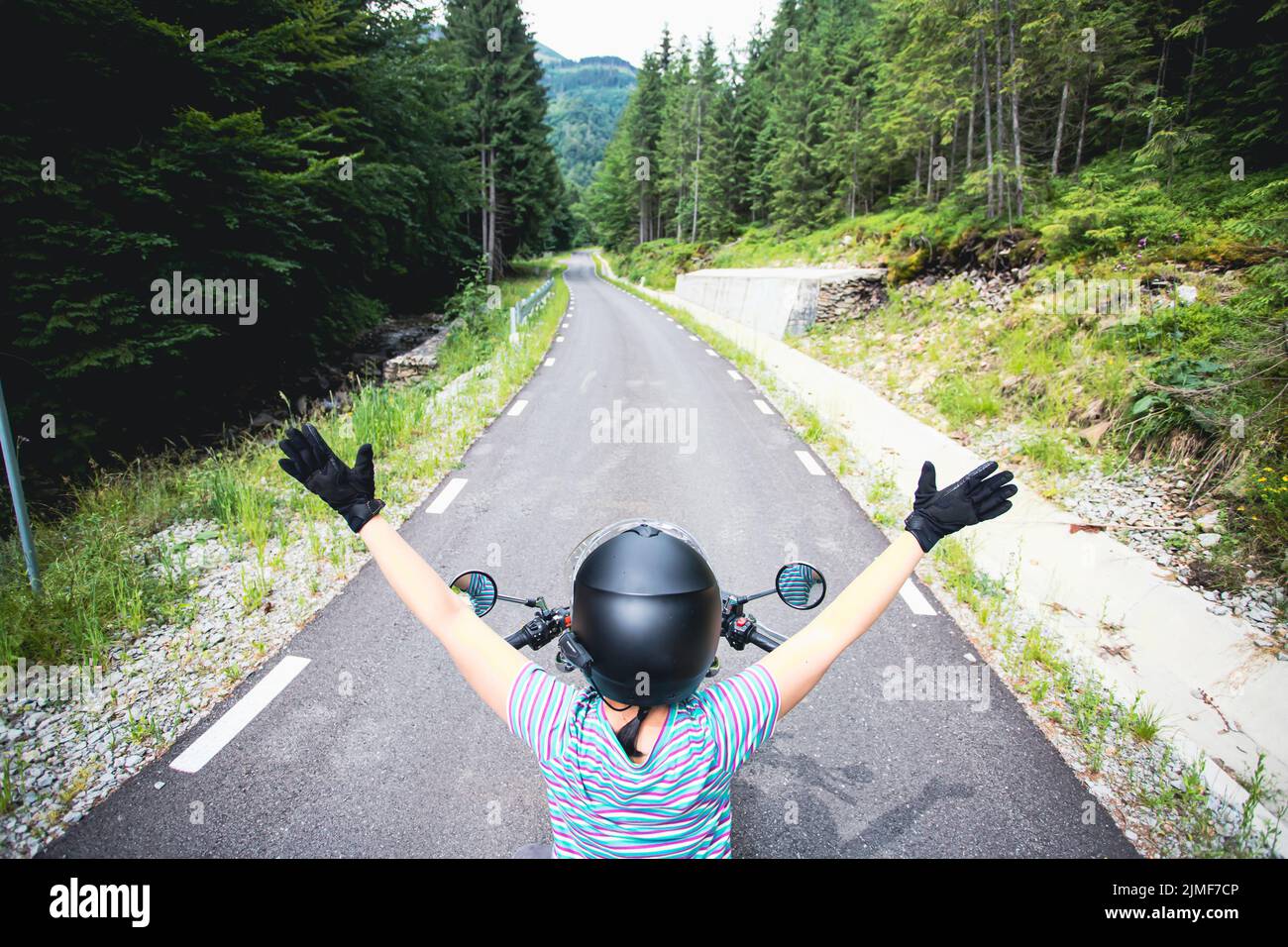 Woman in motorcycle mirror hi-res stock photography and images - Alamy