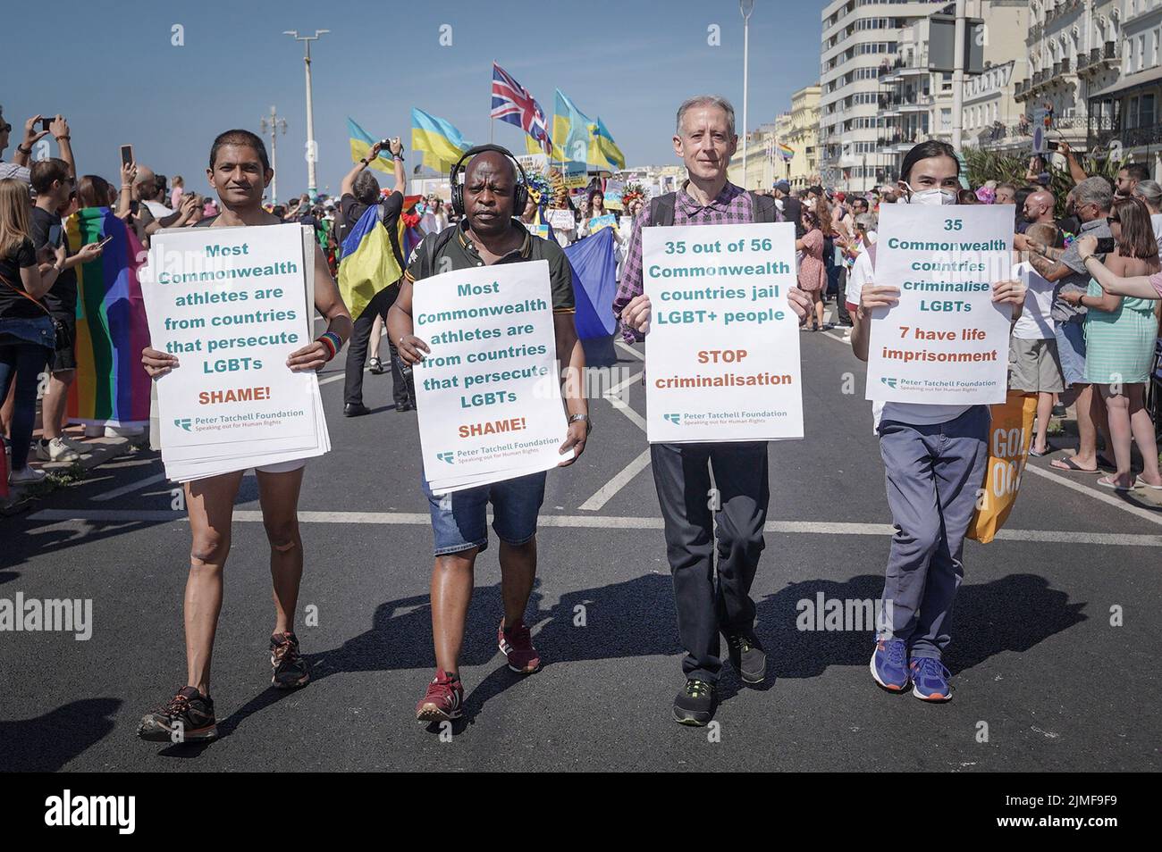 East Sussex, UK. 6th August 2022. Brighton and Hove Pride 2022. Human rights campaigner Peter Tatchell (2nd Right)joins the parade as thousands attend the annual LGBT+ celebration march from Hove Lawns to Preston Park. Credit: Guy Corbishley/Alamy Live News Stock Photo