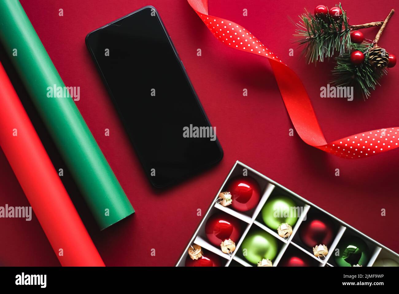 Christmas phone app and holiday message concept. Smartphone with blank