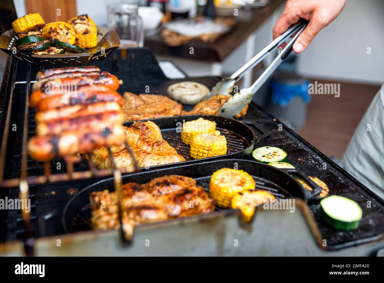 Grill barbecue outdoors on the backyard. Bbq party. Stock Photo