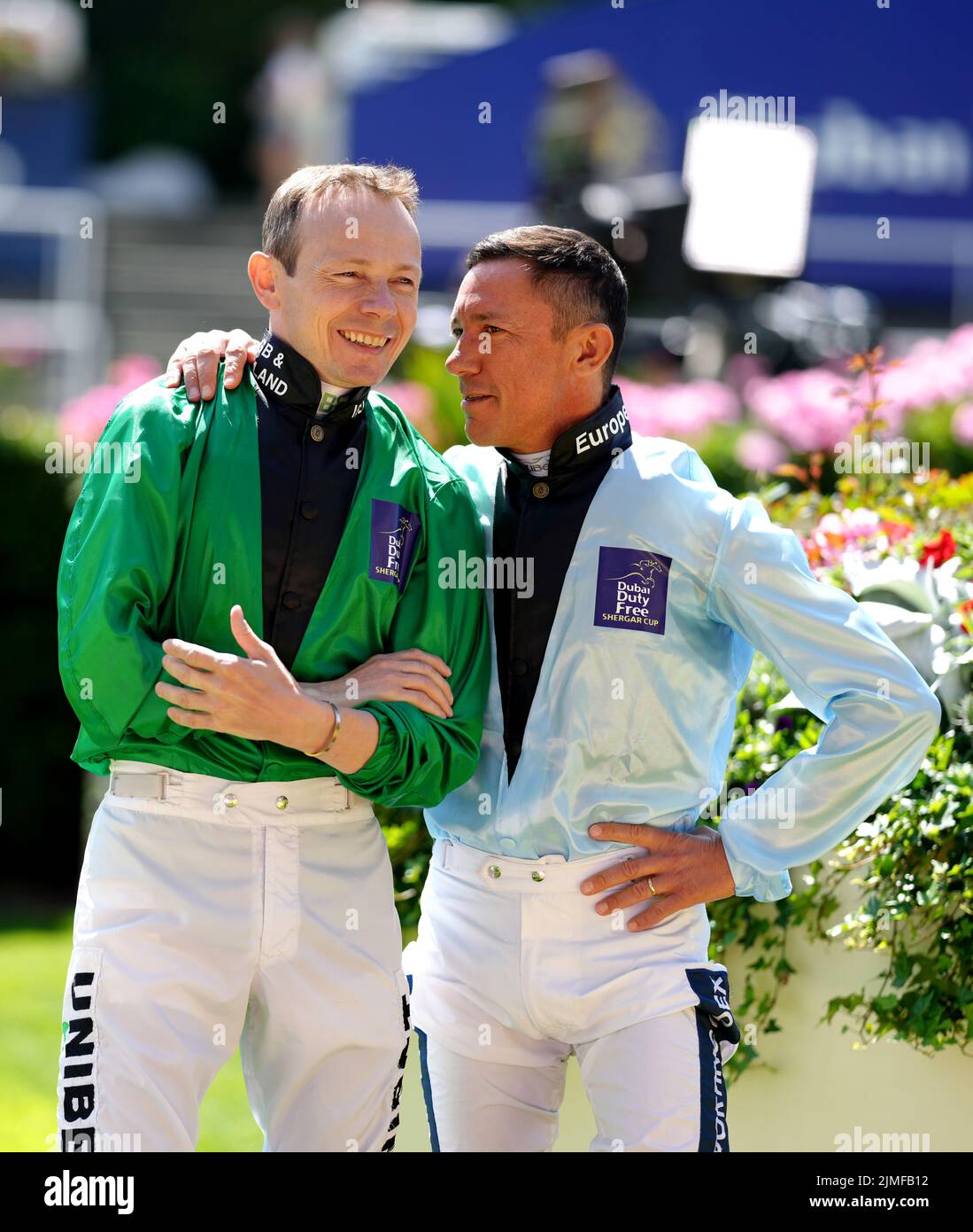 Jamie Spencer of Great Britain and Ireland, (left) has a laugh with Frankie Dettori, Europe (right) during the opening ceremony the Shergar Cup Meeting at Ascot Racecourse. Picture date: Saturday August 8, 2022. Stock Photo