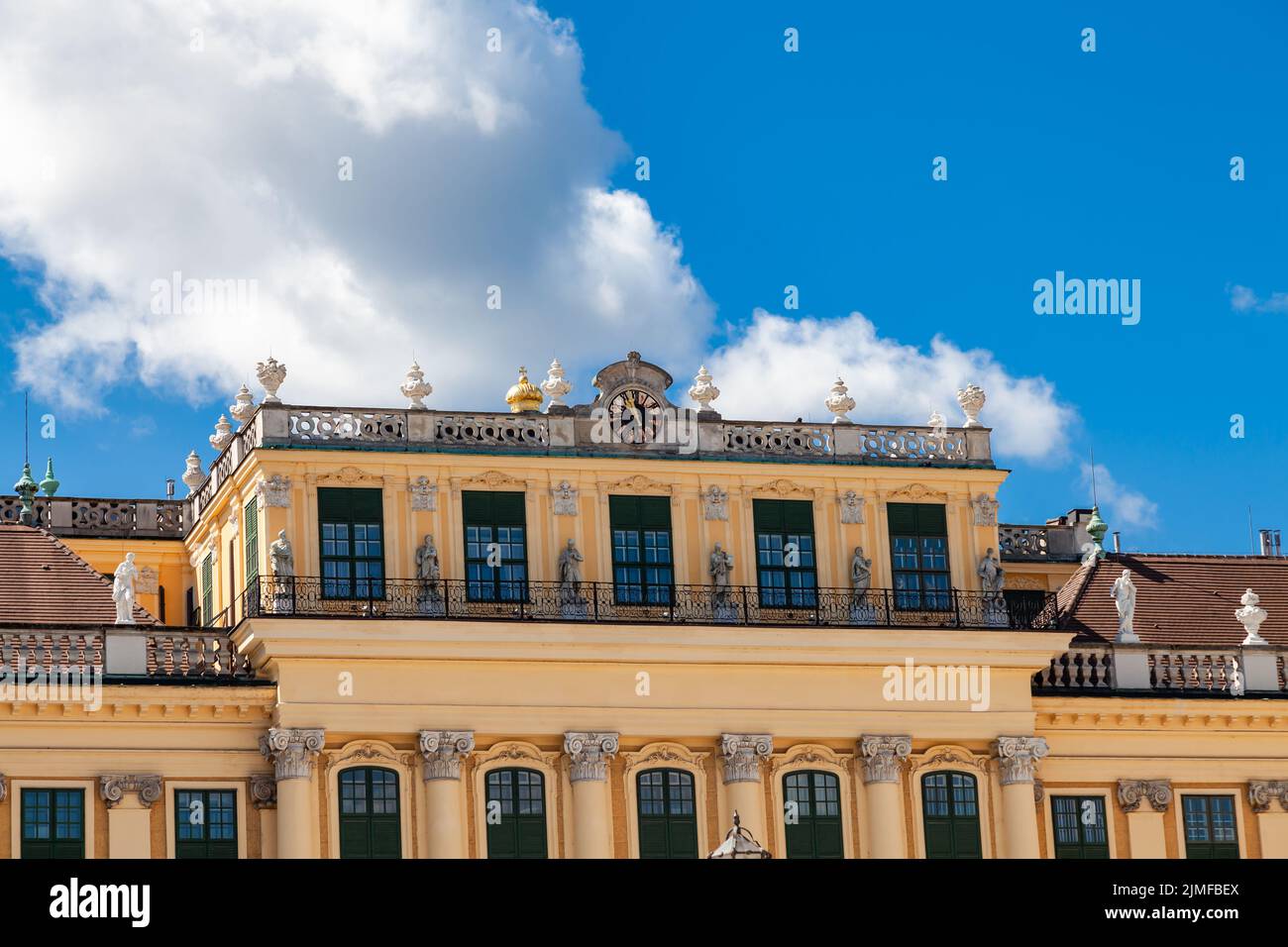 View of beautiful sculpture decorated on the roofline of Schonbrunn palace. Stock Photo
