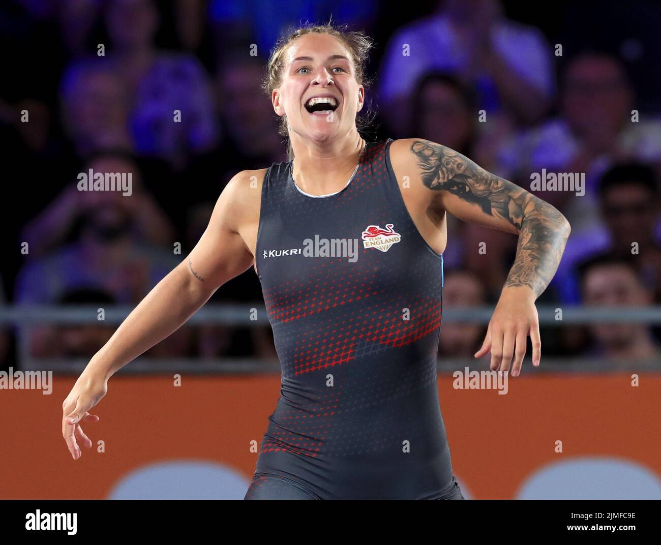 England’s Georgina Nelthorpe celebrates winning against Mauritius’s Marie Vilbrun in the Women’s Freestyle 76kg Quarter Final at the Coventry Arena on day nine of the 2022 Commonwealth Games. Picture date: Saturday August 6, 2022. Stock Photo